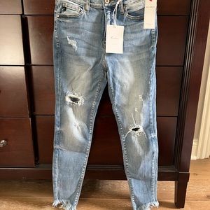 Never worn, new with tags Kansan distress skinny jeans